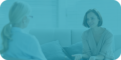 Woman speaking with her therapist